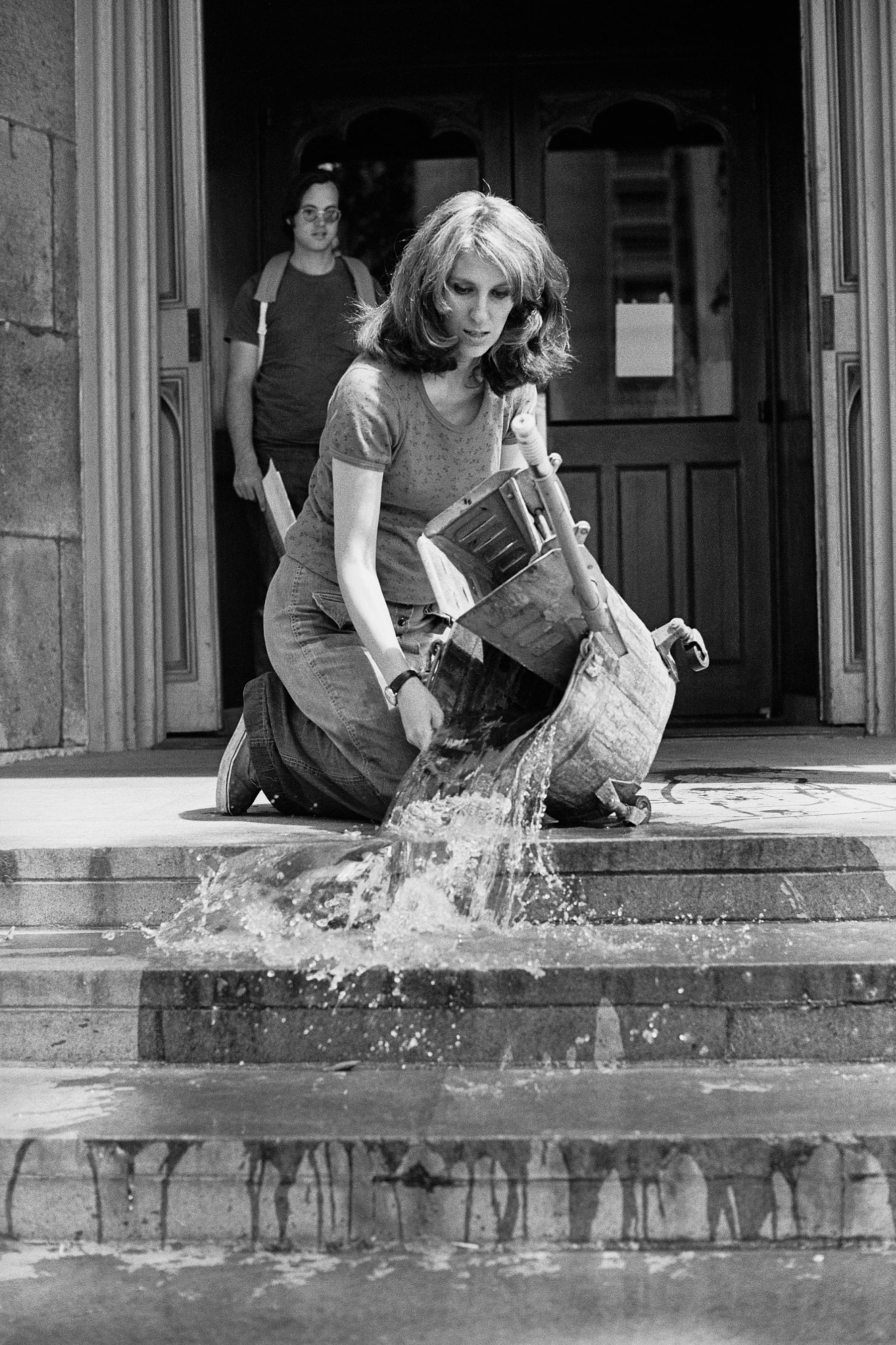Mierle Laderman Ukeles, Washing / Tracks / Maintenance: Outside, 1973, Part of Maintenance Art performance series, 1973-1974, Performance at Wadsworth Atheneum, Hartford, CT © Mierle Laderman Ukeles, Courtesy the artist and Ronald Feldman Gallery, New York